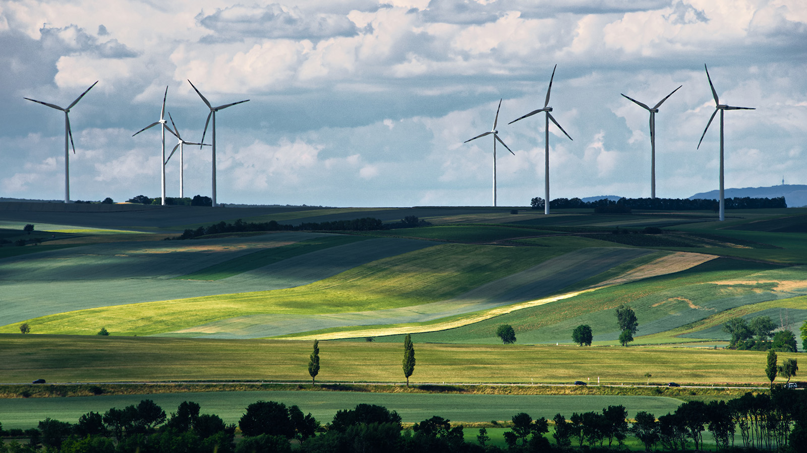 Top 10 Solutions To Reverse Climate Change Green America   Windmills (credit Dmitry Anikin) 